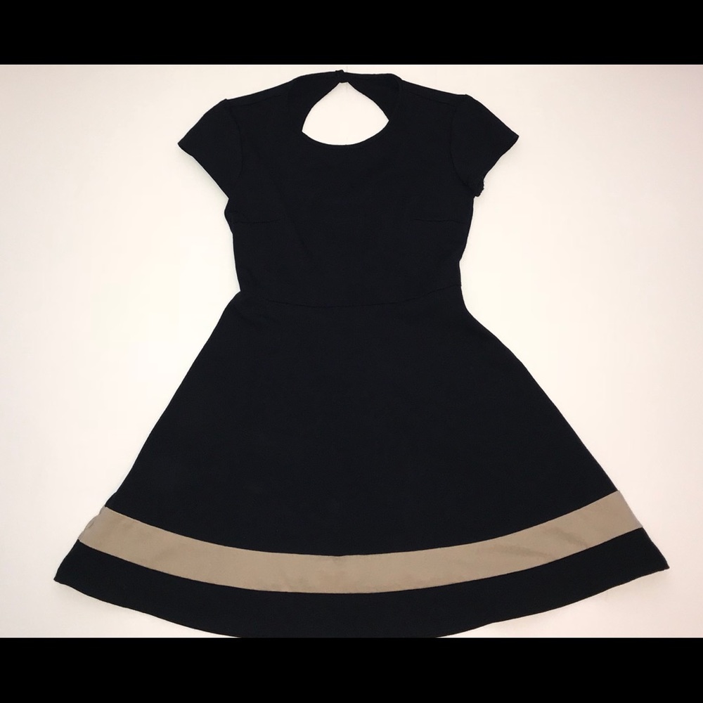 Navy blue Peephole dress with tan stripe.